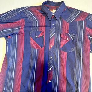 Great looking Wrangler Pearl Snap Western Shirt. Poly/cotton blend
